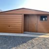 Blechgarage 6m x 5m, holzähnlich, mit Nische
